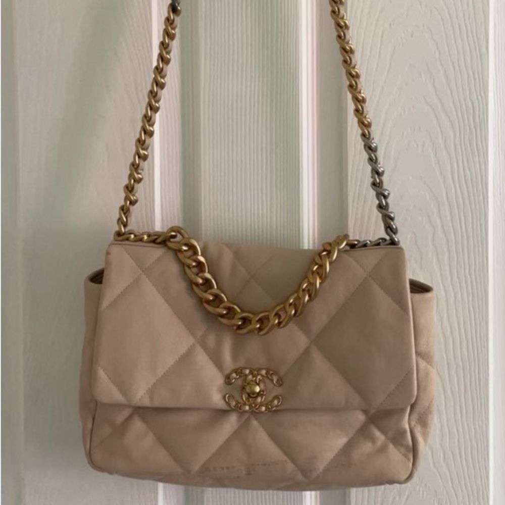 Blush Pink Lamb skin Chanel bag with Tri-colored chain